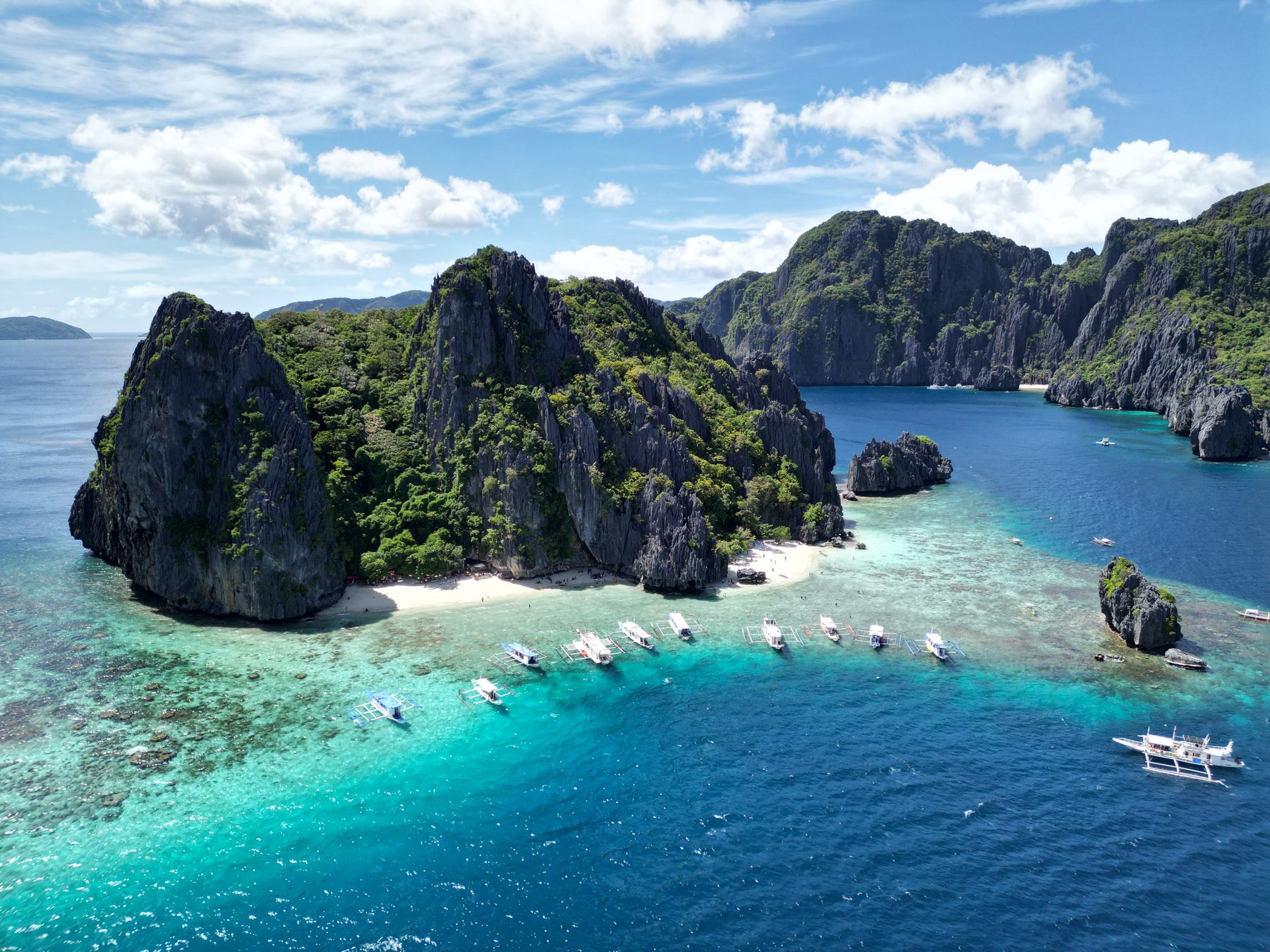 Kayaking beneath El Nido's limestone cliffs